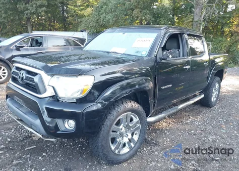 2015 Toyota Tacoma Base V6 z USA, uszkodzony, nr VIN 3TMLU4EN7FM174067